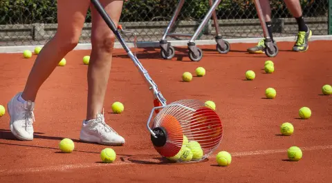 Kollectaball in use on a clay court
